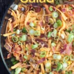 image of prepared recipe for Pinterest with text overlay title Cornbread Salad