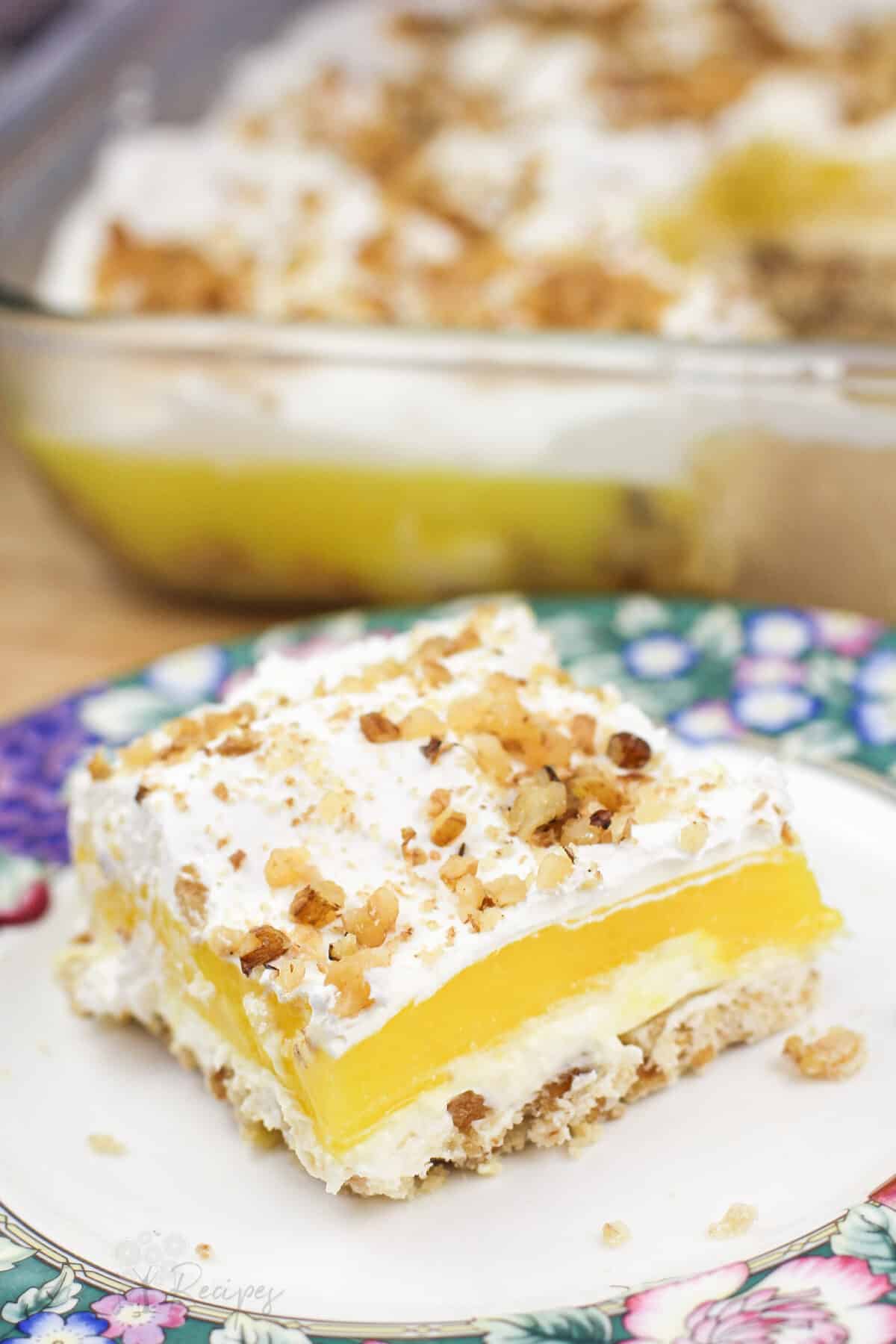 portion of Lemon Lush on floral dish