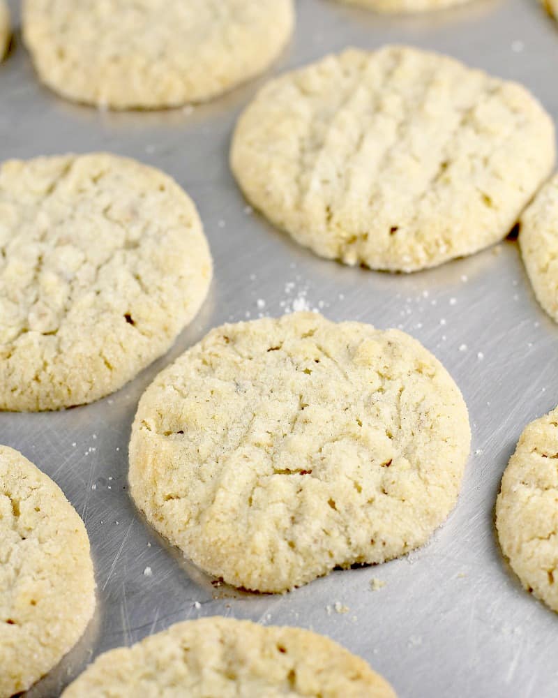 cooked potato chip cookies on a metal bake sheet