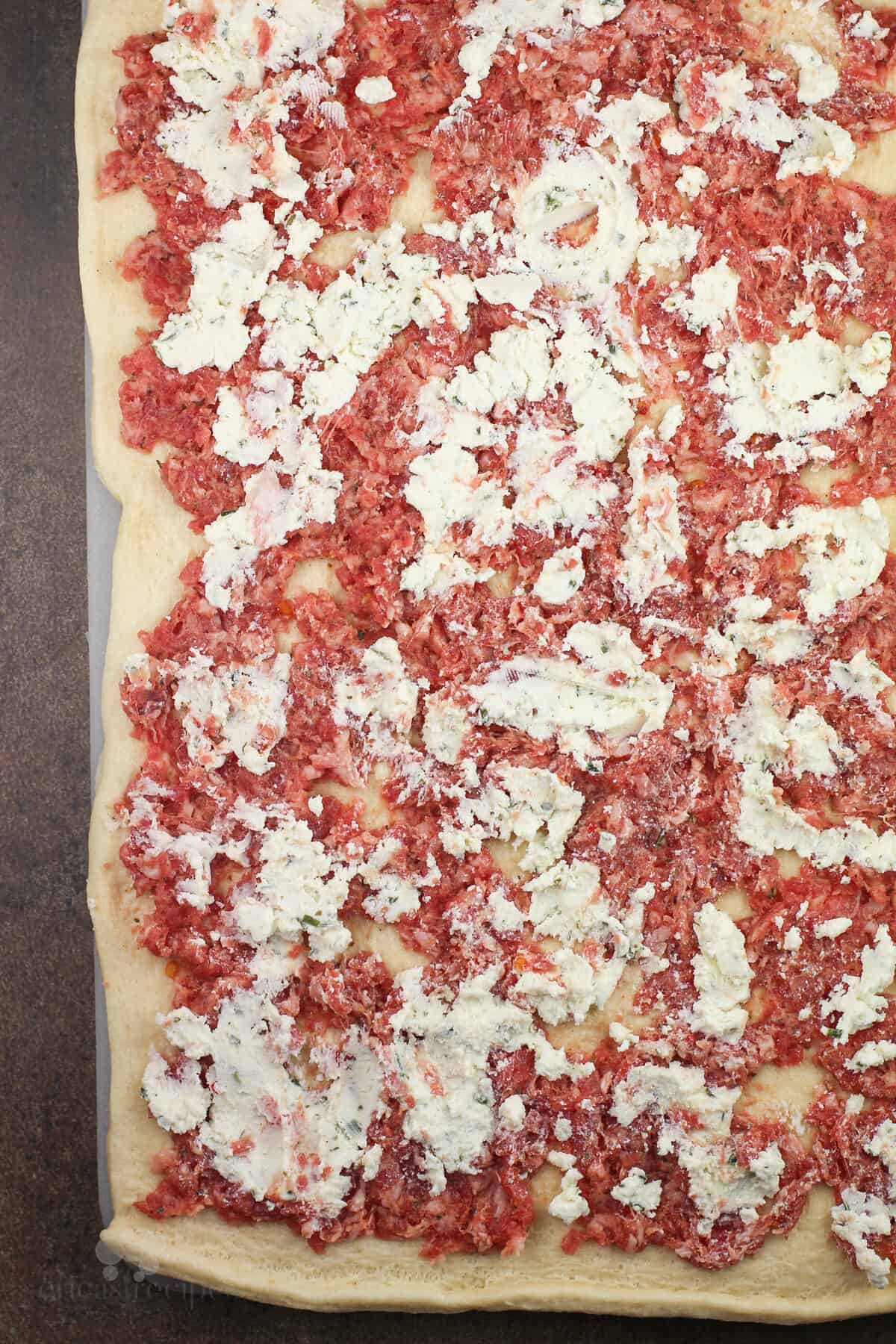 sausage and Boursin spread on crescent dough