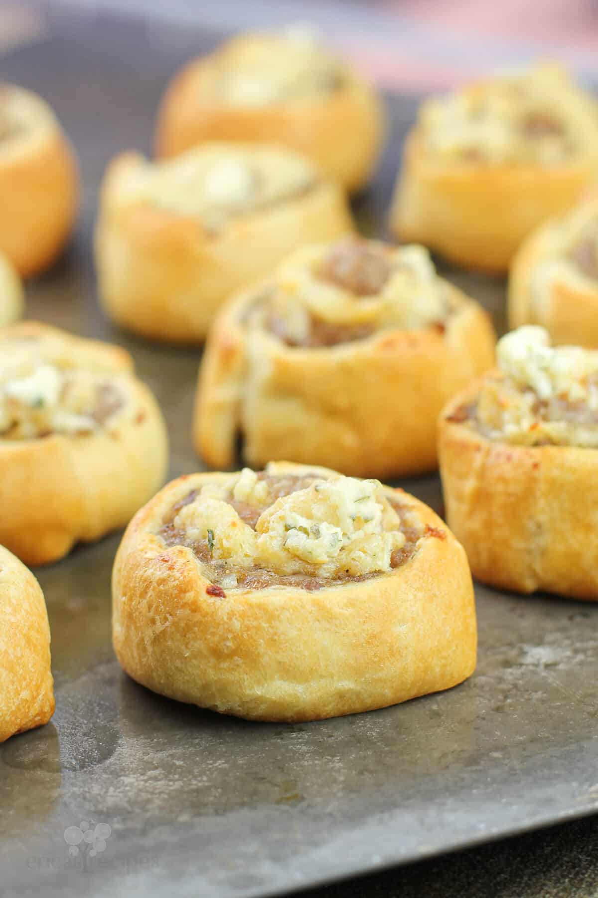 cooked Boursin pinwheels on bake sheet