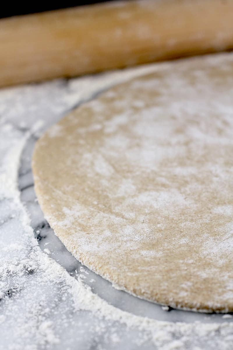 the dough rolled out with on a marble surface