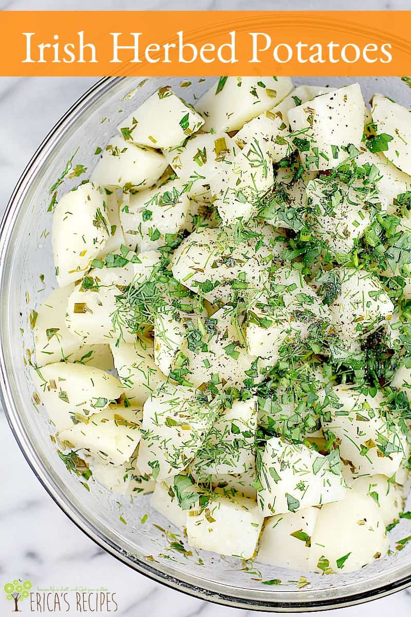 This cozy warm side dish with seasoned boiled potatoes is perfect for St Patrick's Day or any occasion to get your Irish herbed potatoes, Irish food game on. Creamy soft boiled potatoes, tossed in a lemony, buttery, heavily herbed vinaigrette, served at will to a crowd. #food #recipe #Ireland #Irishpotatoes #boiledpotatoes #potato