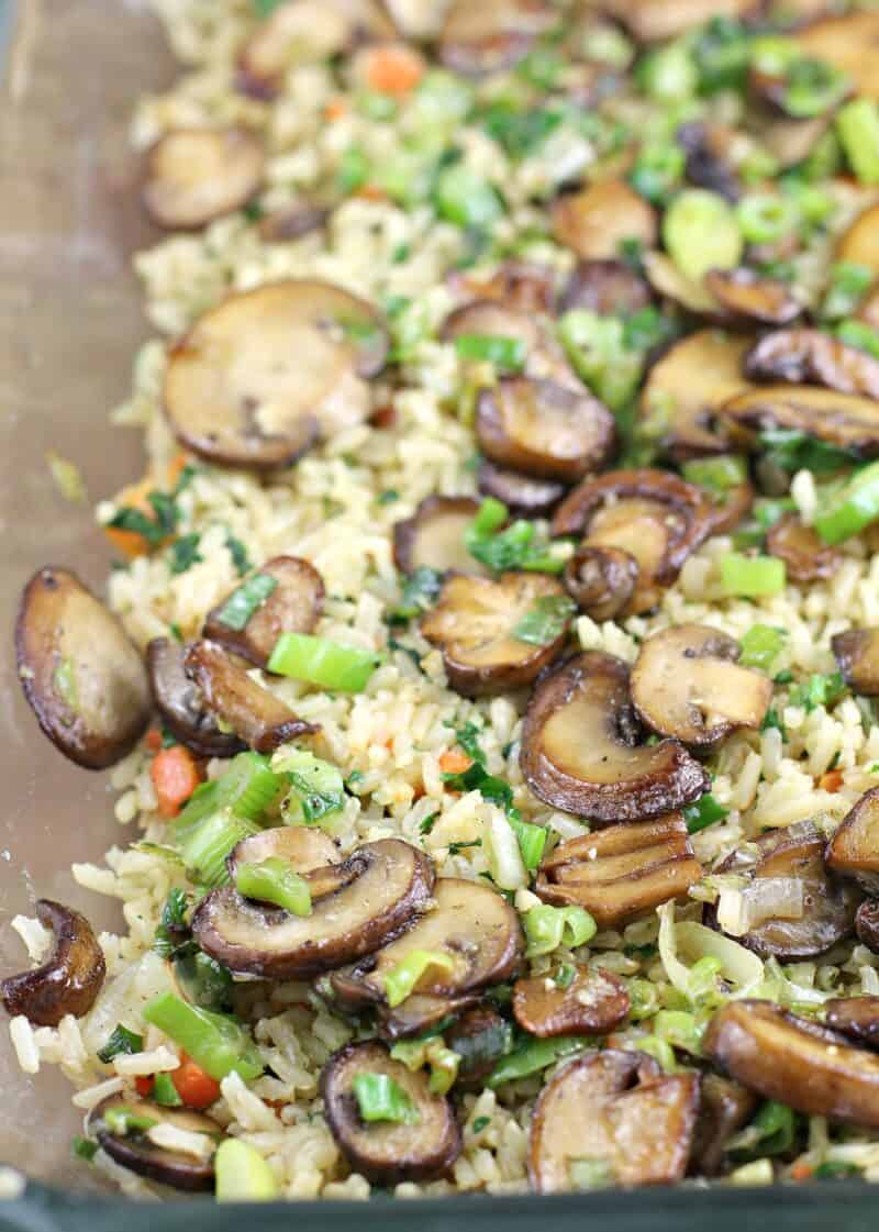 mushrooms and green onion layered on brown rice