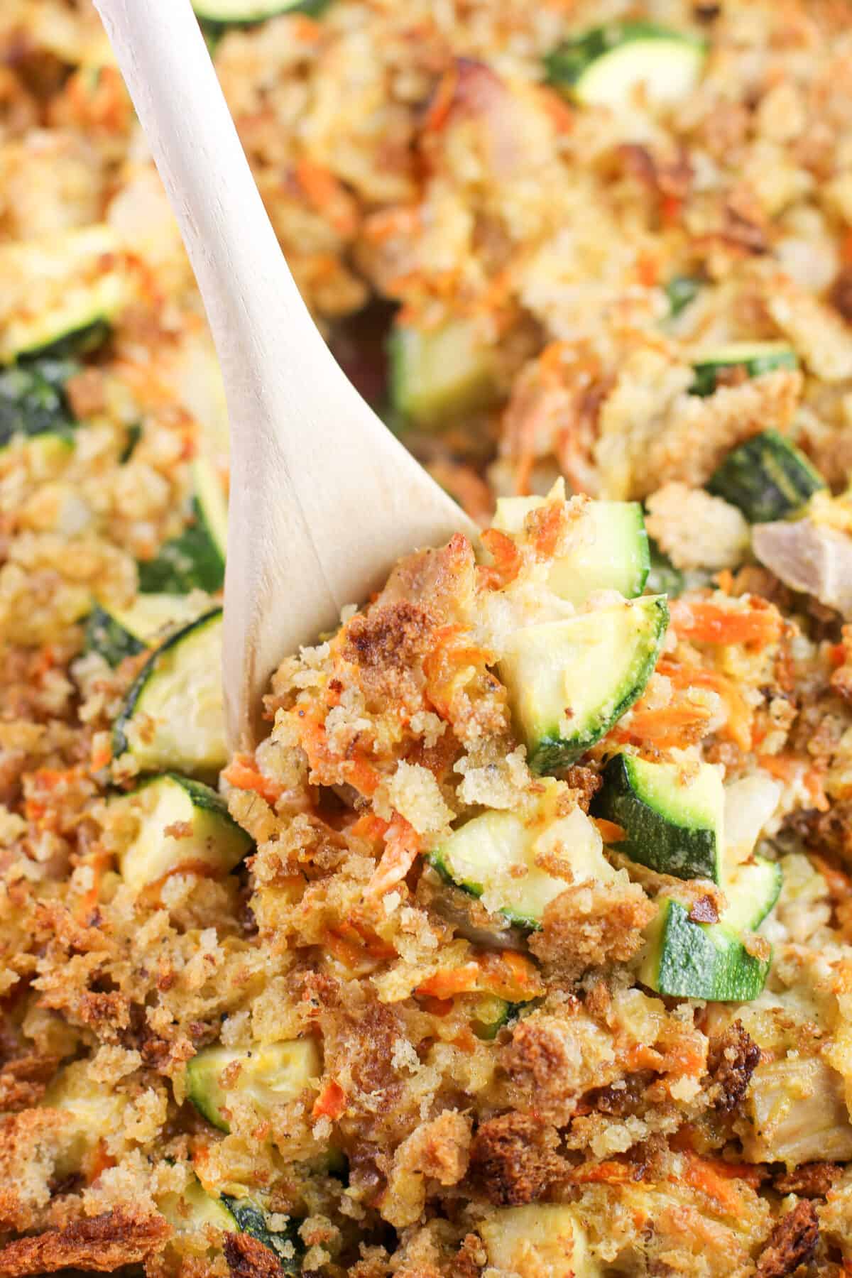 wood spoon in prepared casserole