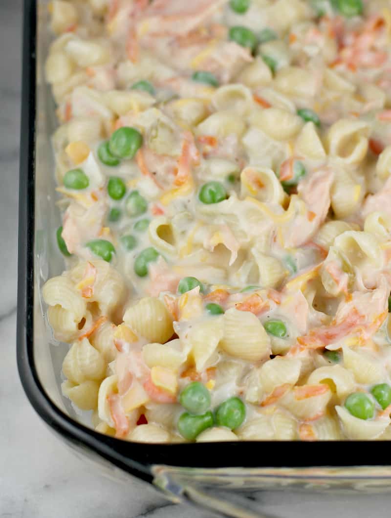 prepared uncooked casserole in a glass bake dish, without crackers on top yet