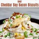 image for pinterest of finished recipe with text overlay Shrimp Gravy over Cheddar Bay Bacon Biscuits