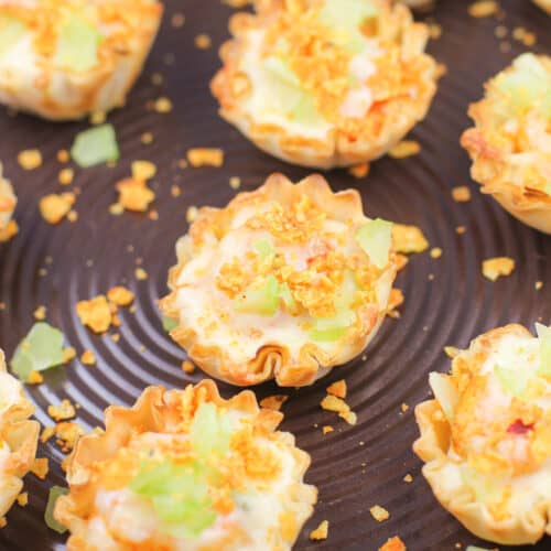 buffalo shrimp bites on metal bake sheet
