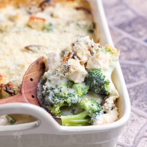 wood spoon in casserole of Chicken Divan