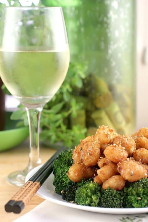 side view of the completed recipe with a glass of wine on the side