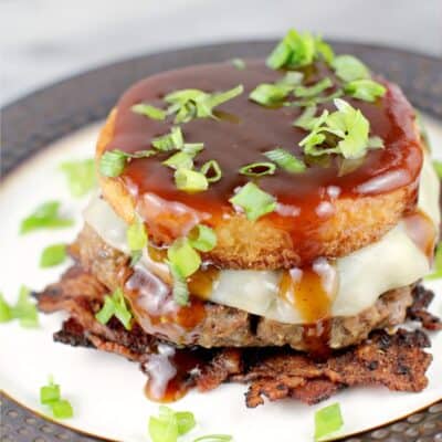 Low Country BBQ Burger with Bacon Weave and Smoked Gouda Grit Cake