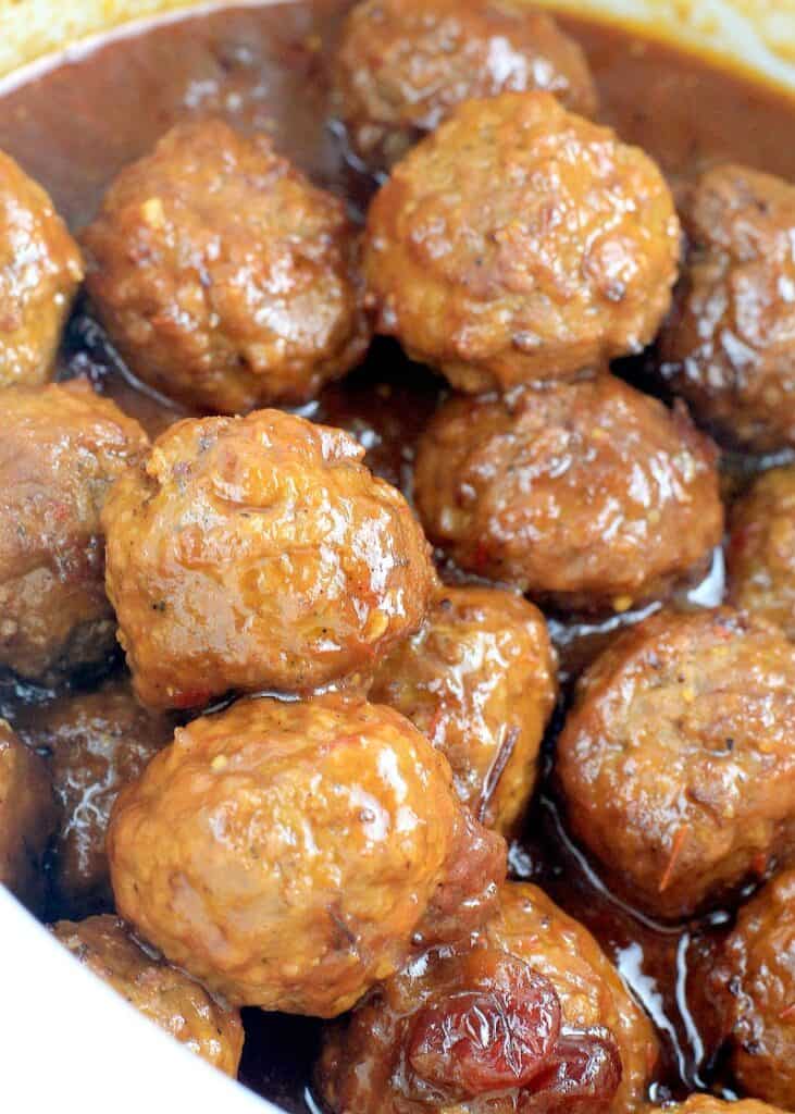 angled down view of the saucy meatballs in a white crockpot