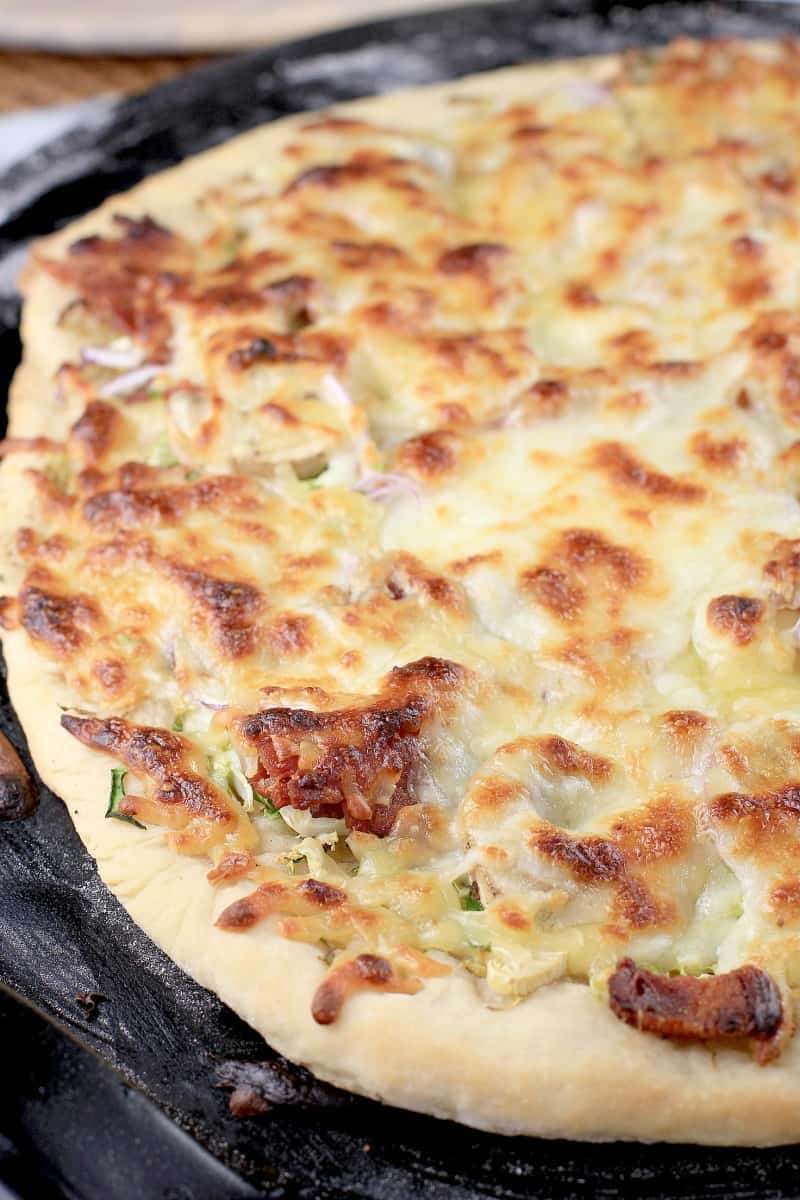 cooked, whole pizza prior to slicing