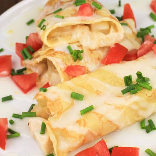zoomed out view of crepes on white plate