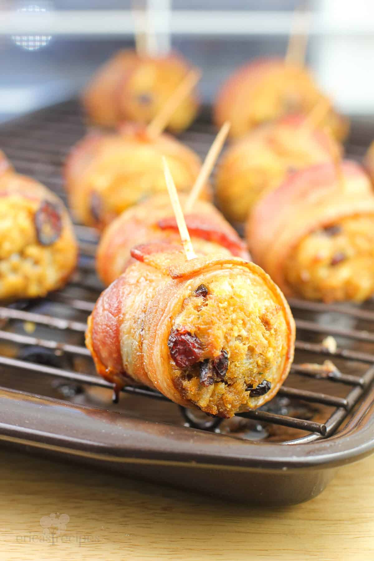 cooked stuffing ball with toothpick inserted on grate