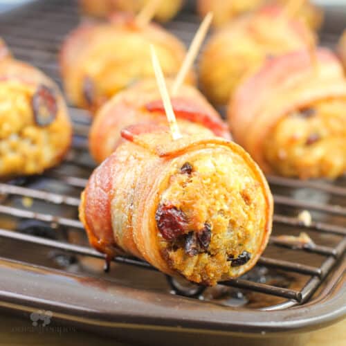 cooked stuffing ball with toothpick inserted on grate