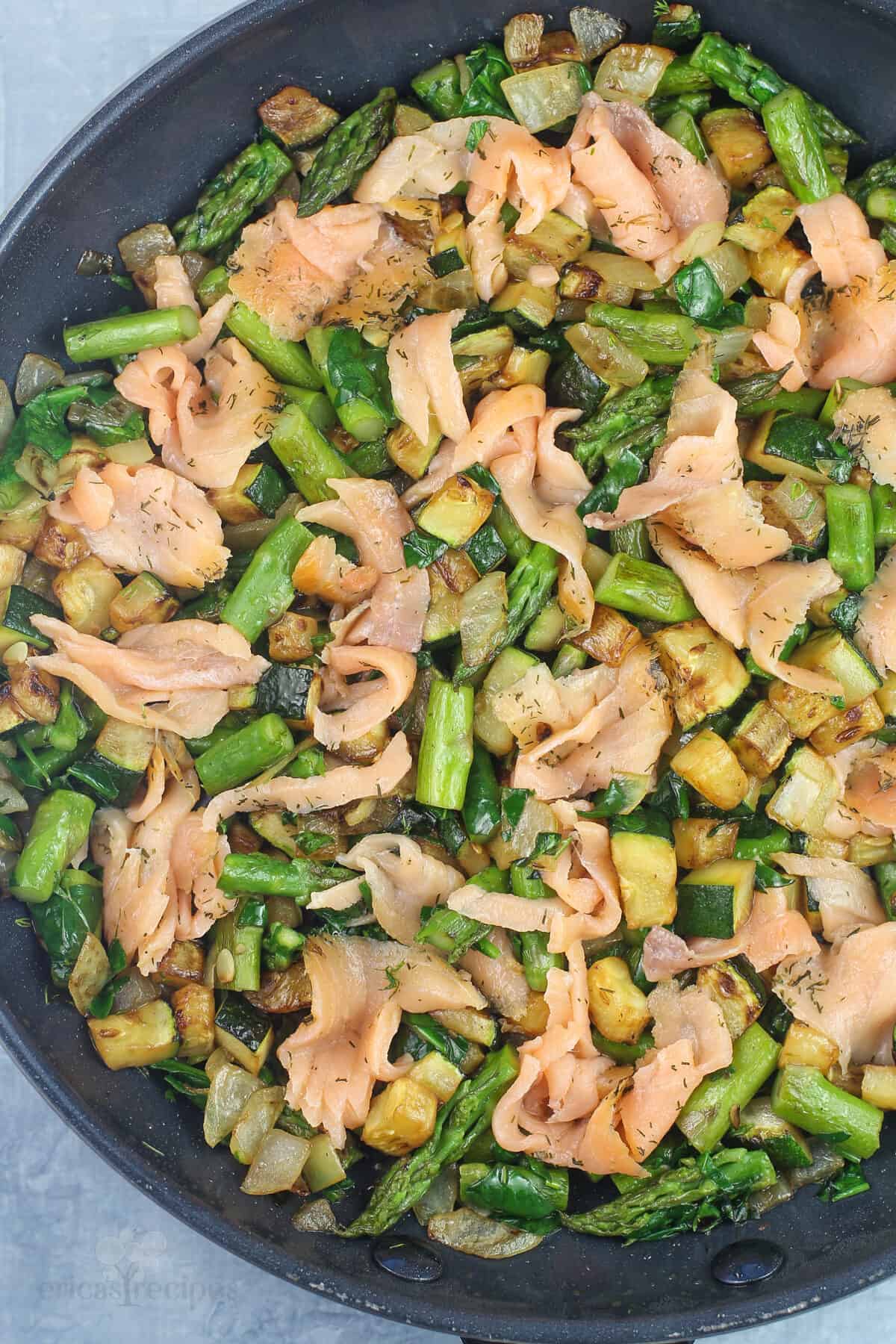 frittata vegetable and smoked salmon ingredients in pan