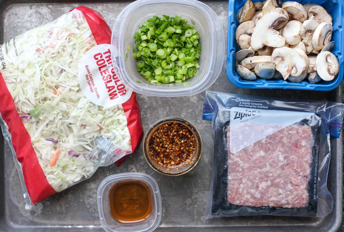 prepped ingredients assembled on rimmed bake sheet