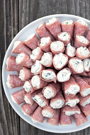 salami rollups on white plate
