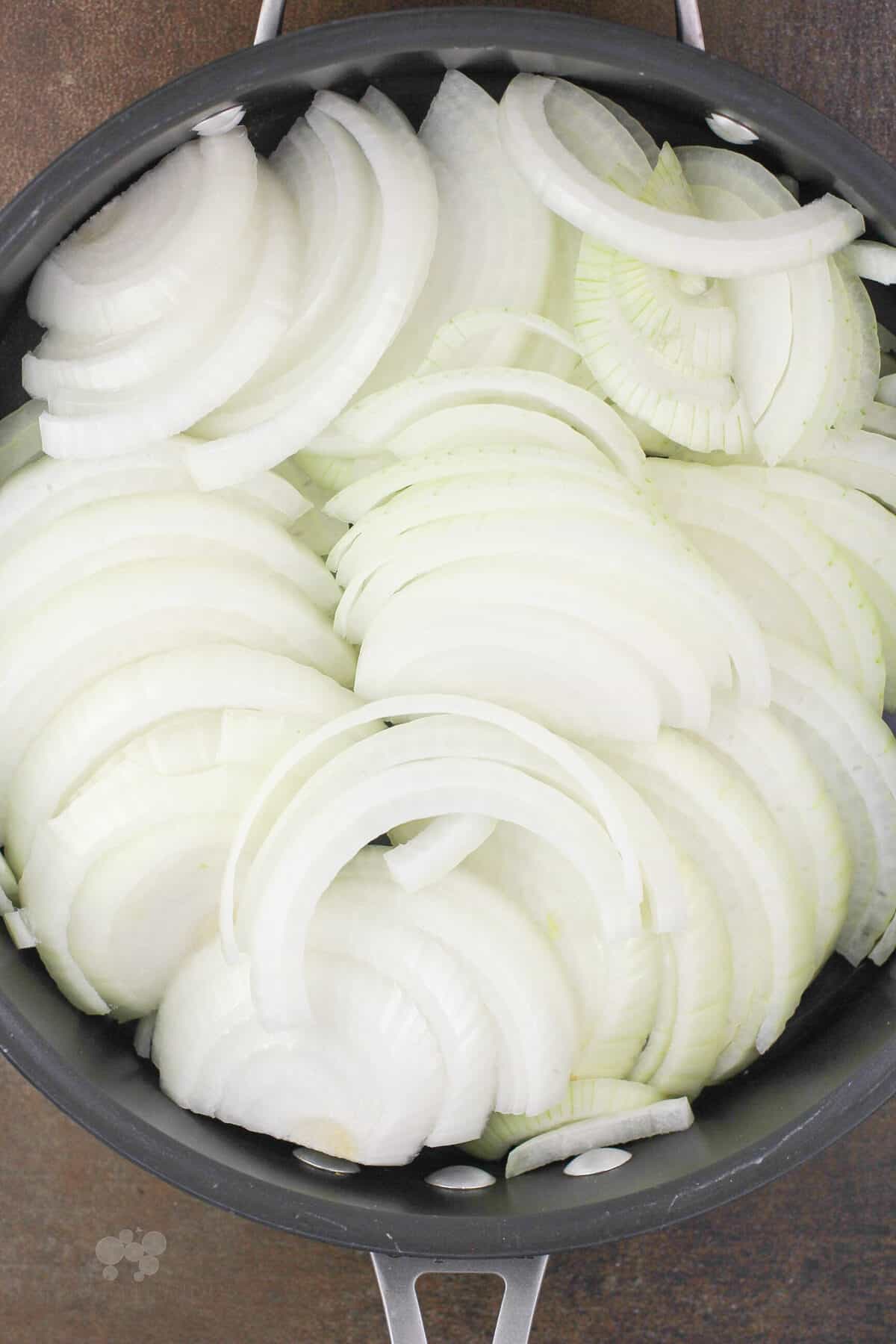 sliced onions in skillet