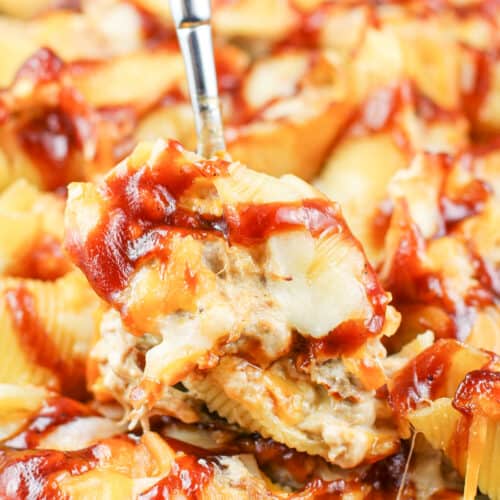spoon holding stuffed pasta shell