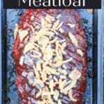 image of meatloaf in pan with text overlay Smoked Meatloaf