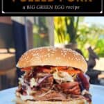 image for pinterest with text overlay juicy smoked pulled pork (a big green egg recipe)