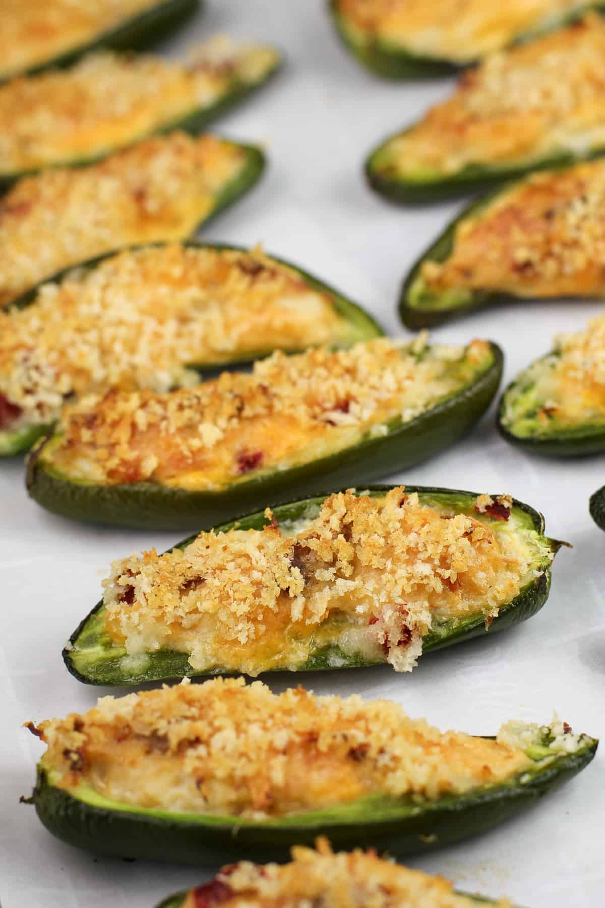 prepared jalapeno poppers on bake sheet