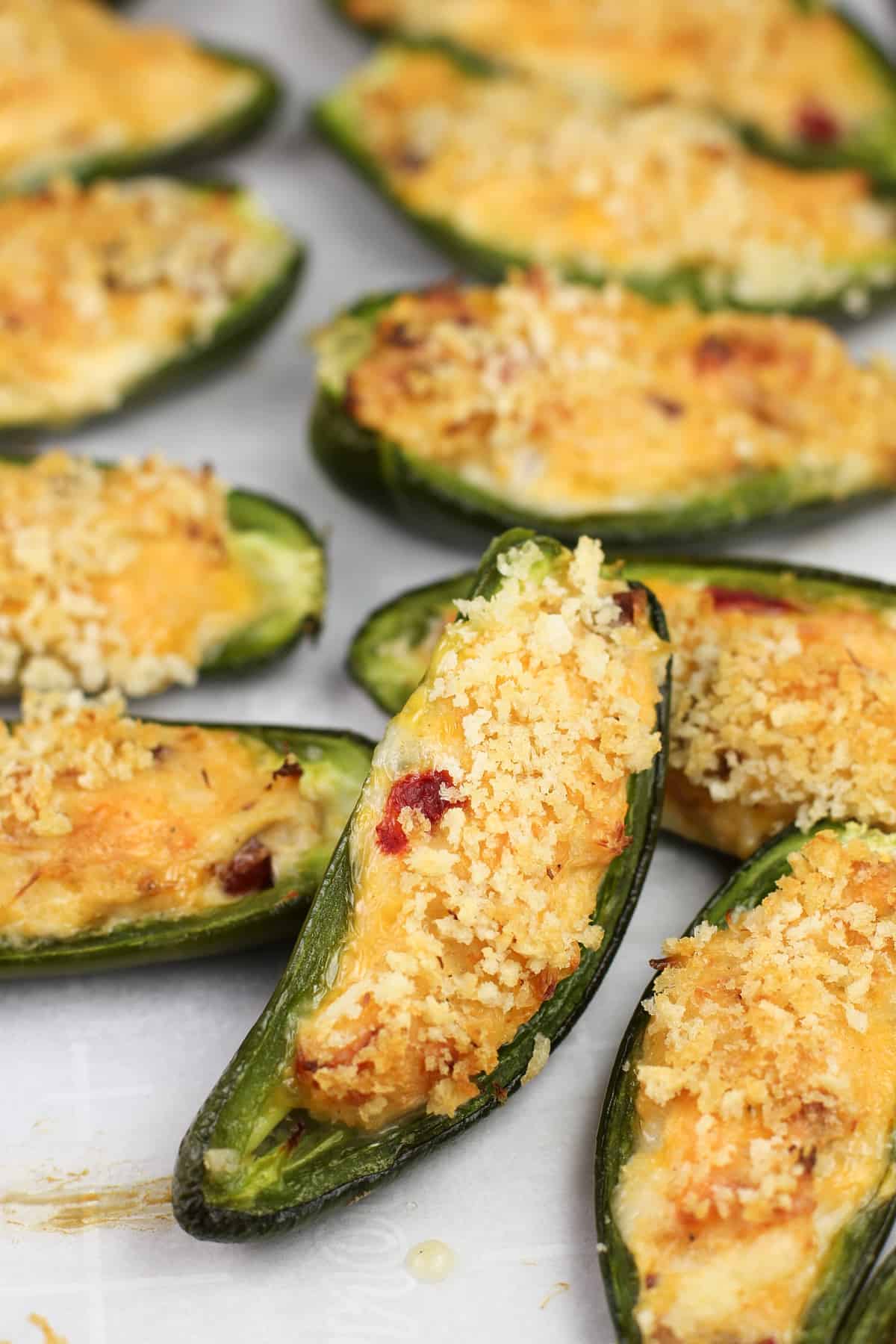prepared jalapeno poppers on bake sheet
