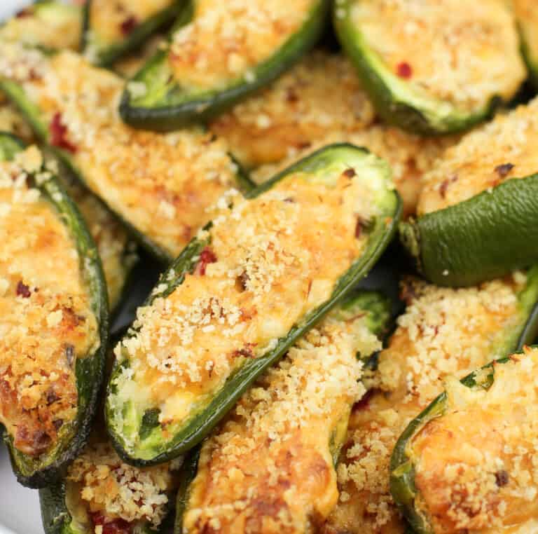 prepared jalapeno poppers on bake sheet