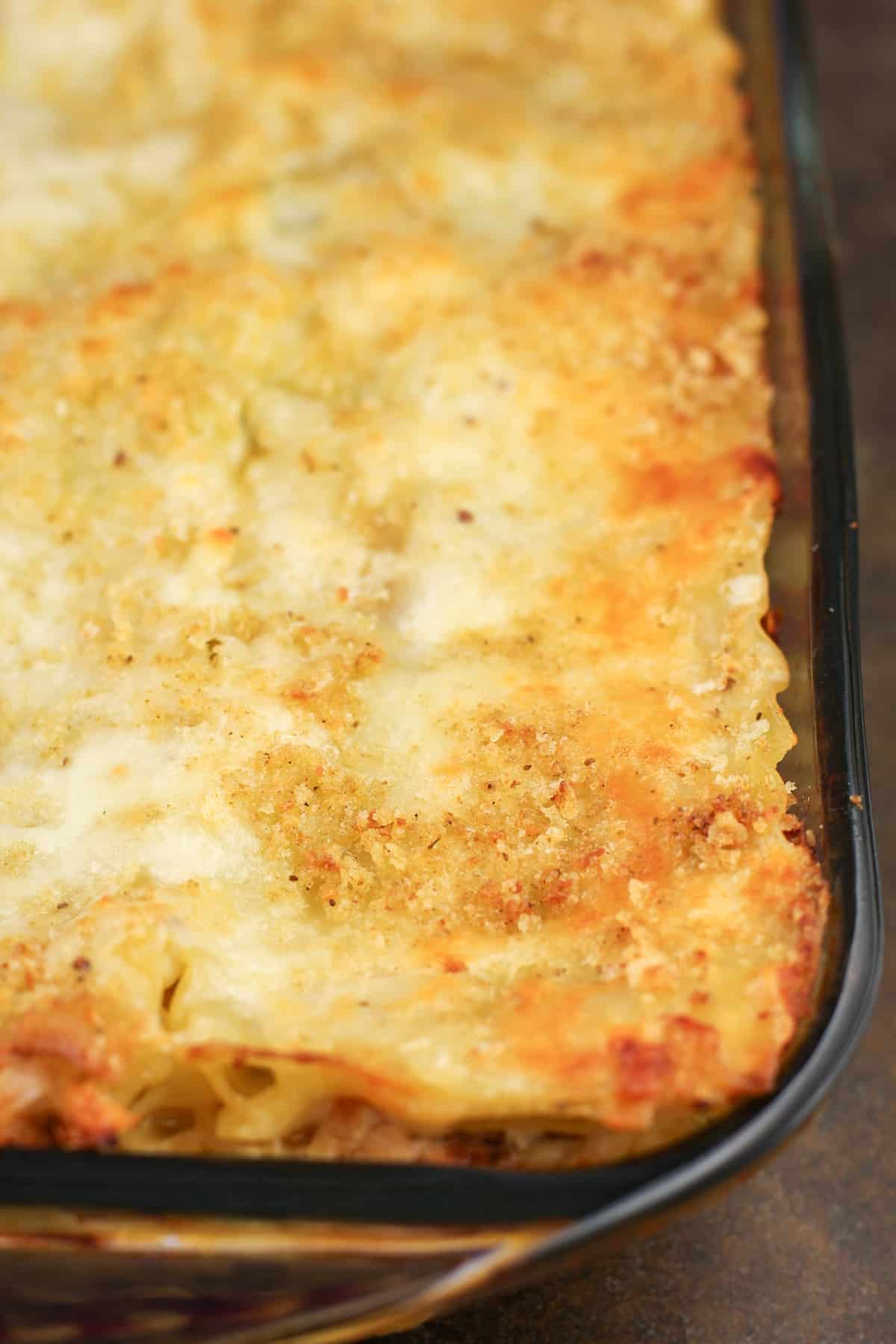 cooked lasagna in glass bake dish