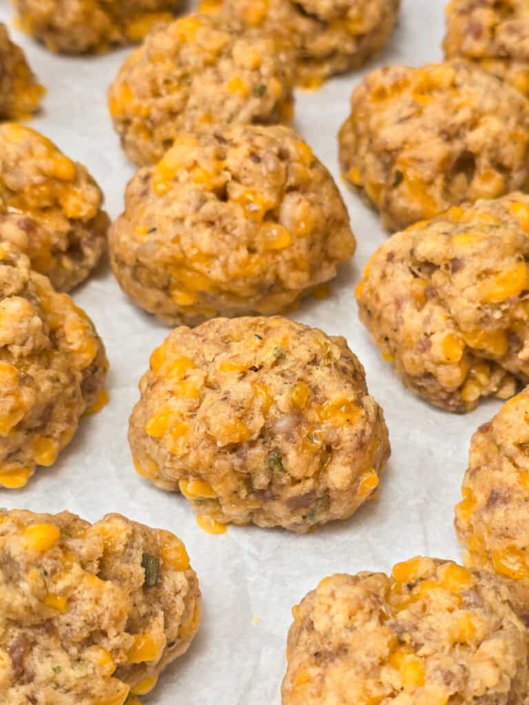 cooked Red Lobster sausage balls on parchment paper